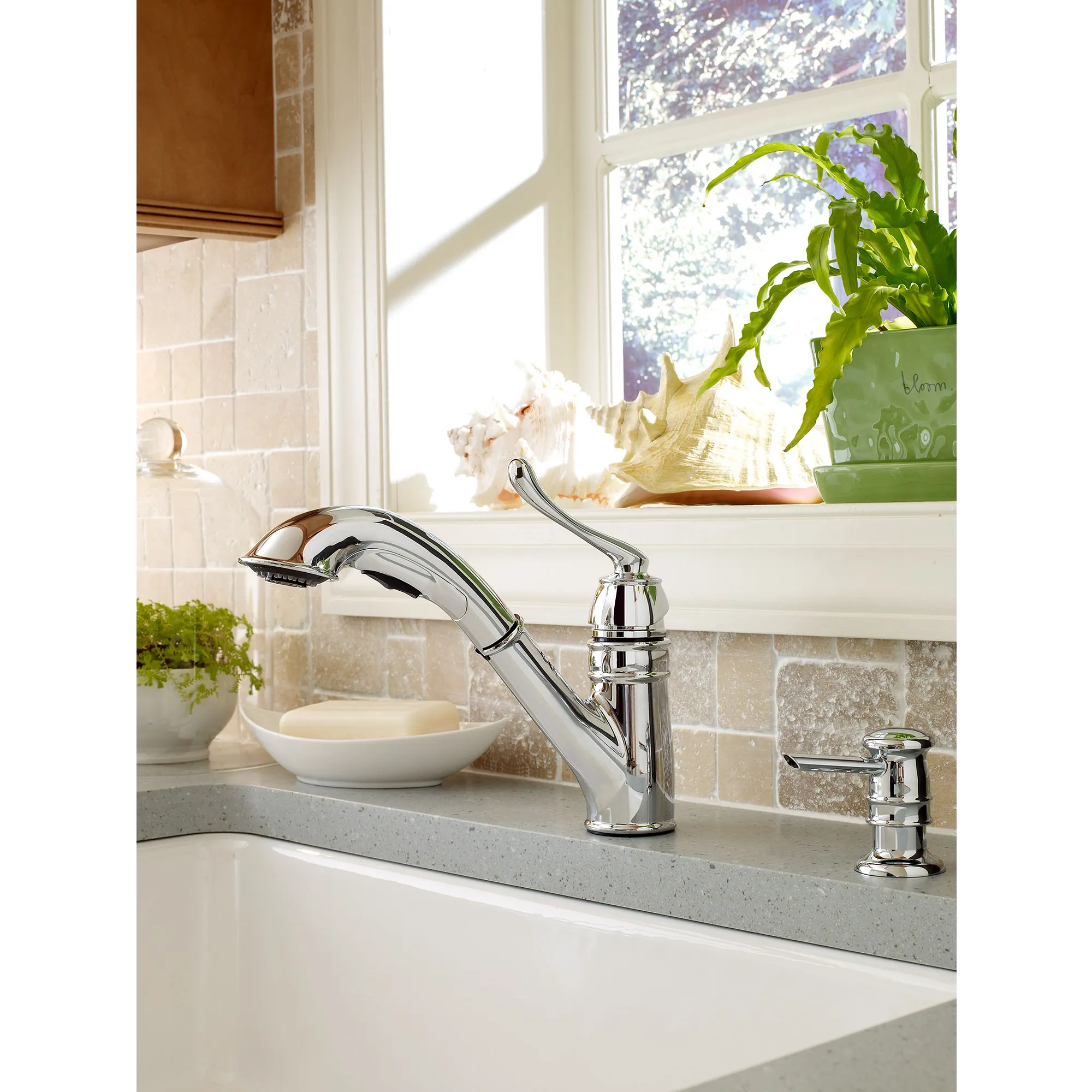 Dorsey Chrome one-handle low arc pullout kitchen faucet - Image 3